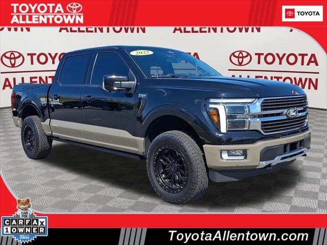 2025 Ford F-150 King Ranch in Black Metallic — front three-quarter view