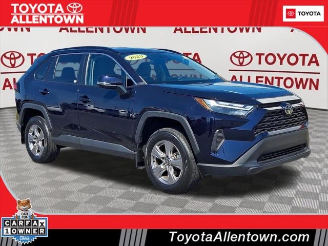 2023 Toyota RAV4 XLE in Blueprint — front three-quarter view