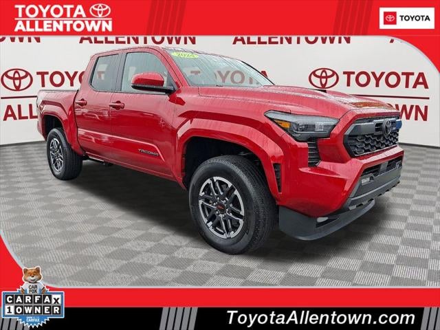 2024 Toyota Tacoma TRD Sport in Supersonic Red* — front three-quarter view