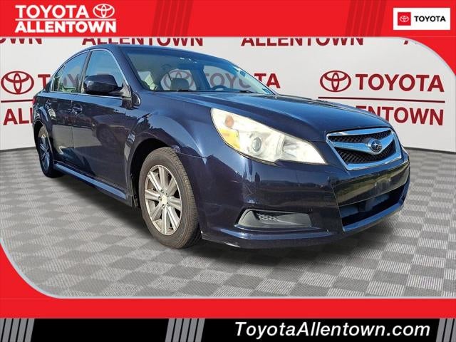 2012 Subaru Legacy 2.5i Premium in Deep Indigo Pearl — front three-quarter view