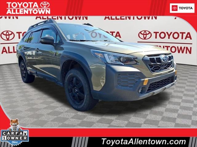 2024 Subaru Outback Wilderness in Autumn Green Metallic — front three-quarter view