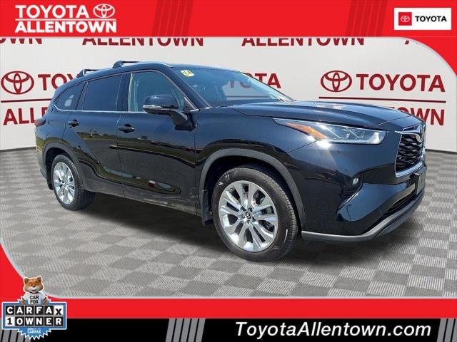 2024 Toyota Highlander Limited in Midnight Black Metal — front three-quarter view