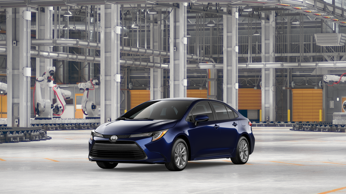 2026 Toyota Corolla LE in Blueprint — front three-quarter view