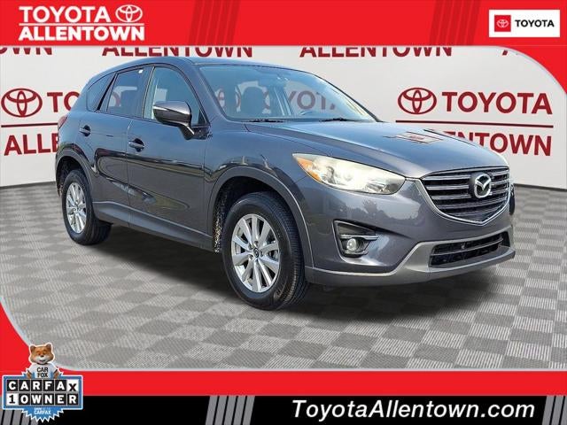 2016 Mazda Mazda CX-5 Touring in Meteor Gray Mica — front three-quarter view