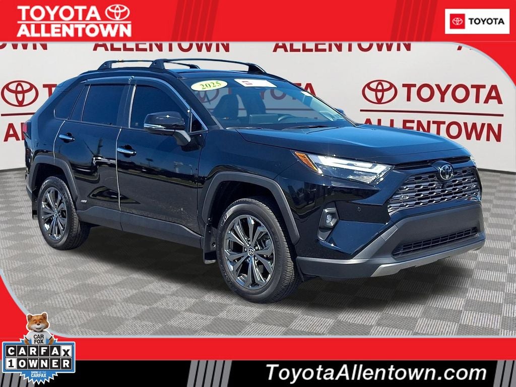2025 Toyota RAV4 Hybrid Limited in Midnight Black Metallic — front three-quarter view