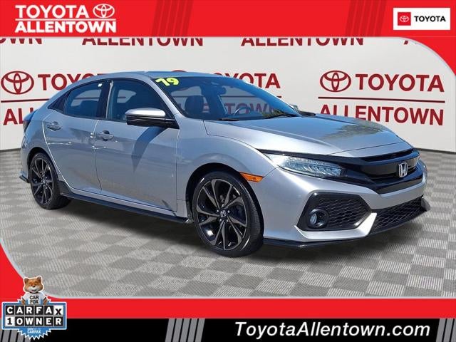 2019 Honda Civic Sport Touring in Silver — front three-quarter view